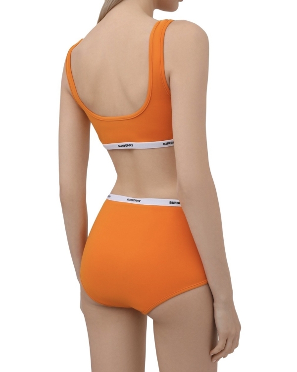 Неоновый купальник, как у Ирины Шейк, —