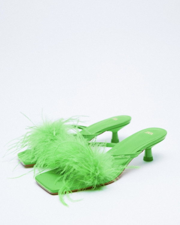 Акцент на перья: смелые образы для невесты