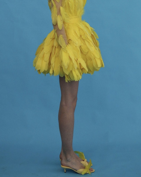 Акцент на перья: смелые образы для невесты