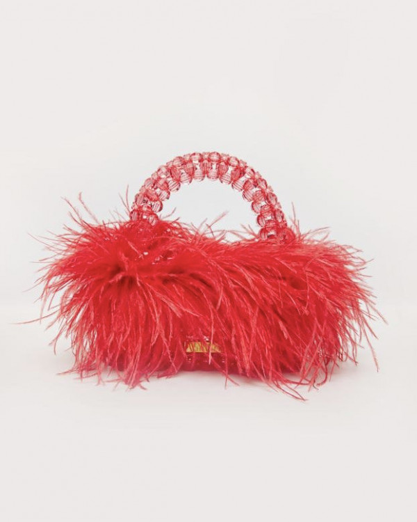 Акцент на перья: смелые образы для невесты