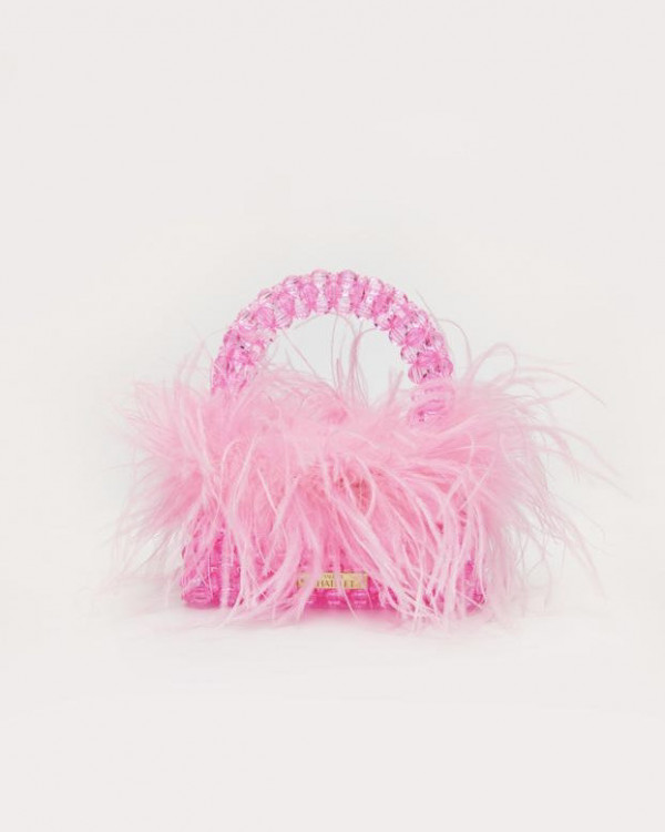 Акцент на перья: смелые образы для невесты