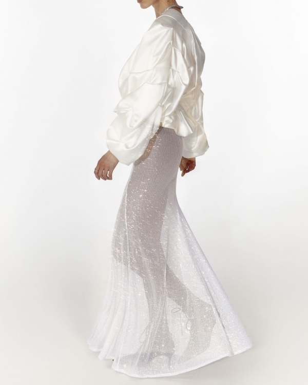 Платья-трансформеры, фантазийные детали и много блеска: что