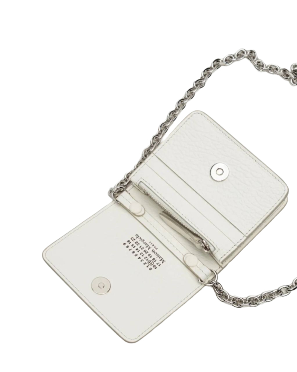 Блестящие, цветочные, стеклянные. 20 модных сумок для