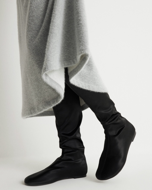 Дутая, похожая на чулки и ковбойская. Какую