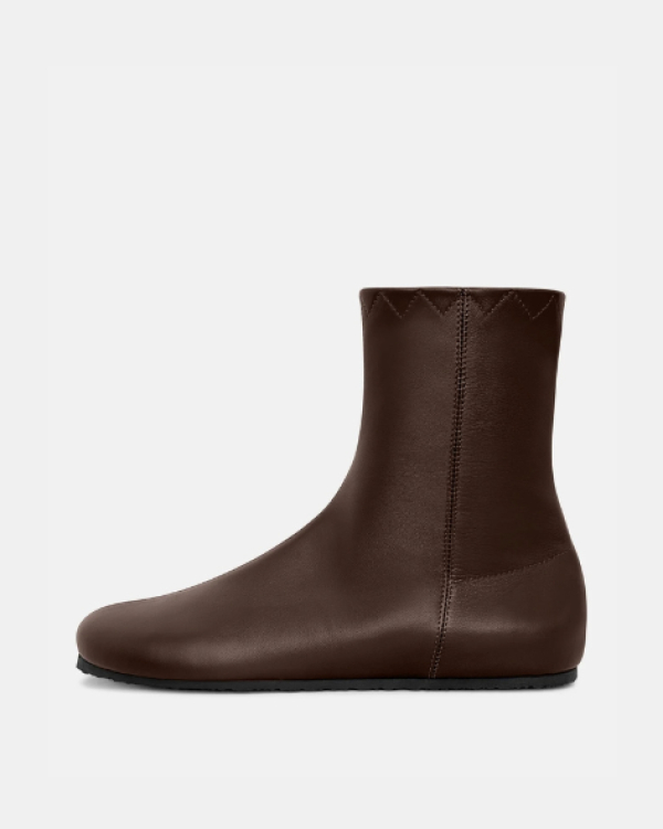 Дутая, похожая на чулки и ковбойская. Какую