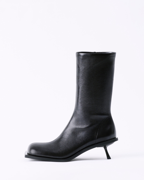 Дутая, похожая на чулки и ковбойская. Какую