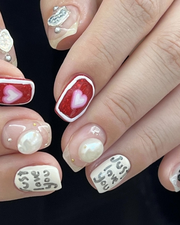Нарисуй любовь: 20 идей маникюра к 14