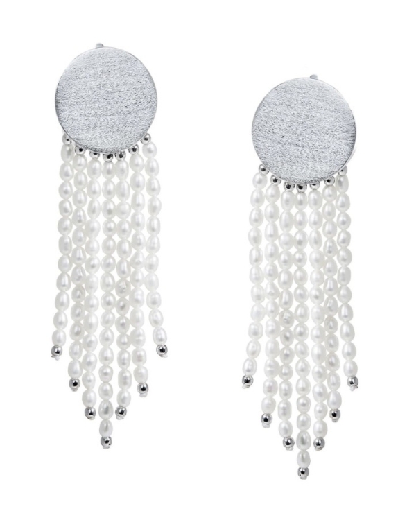 Большие серьги — самый стильный аксессуар для лаконичного