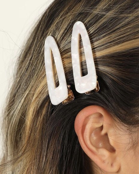 Трендовые прически, которые визуально корректируют лицо