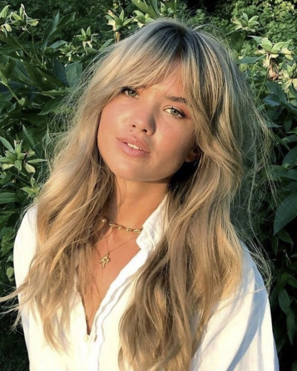 Трендовые прически, которые визуально корректируют лицо